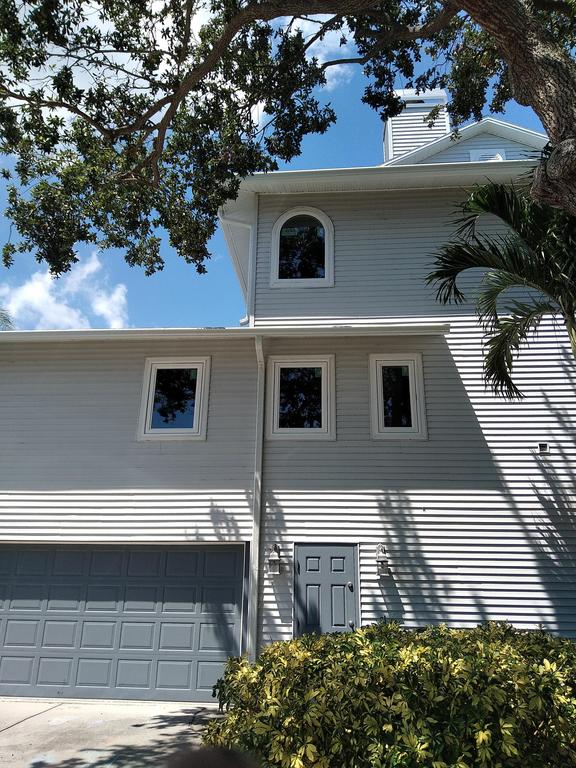Hurricane & Replacement Windows by JMI