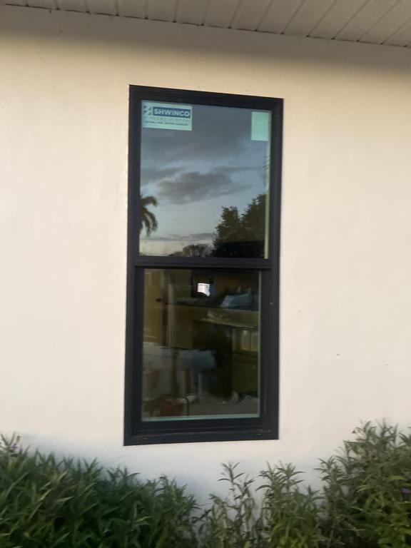 Hurricane & Replacement Windows by JMI